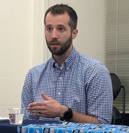 Michael Mead presenting at event